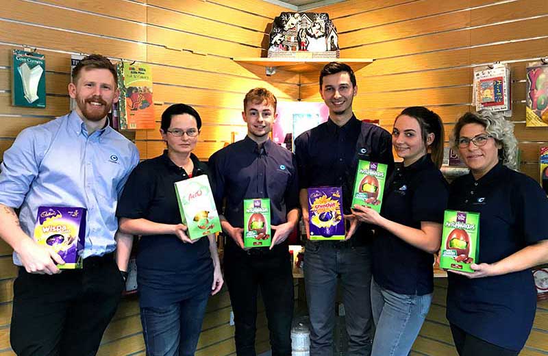 Charpak staff receiving Easter eggs